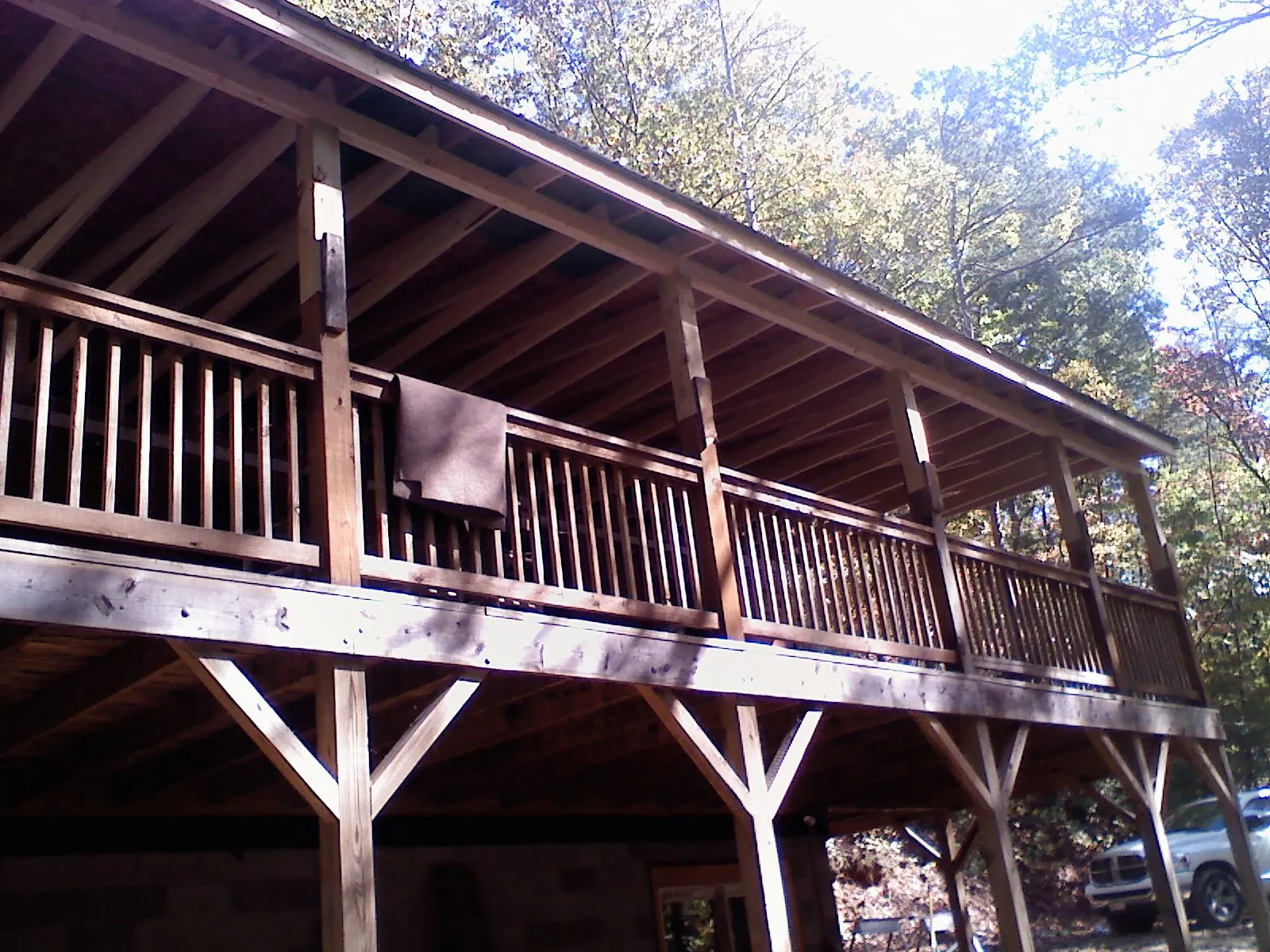 Timber framing under a new elevated porch and deck — Roof Leak Repair in Neola by Roofing Brothers